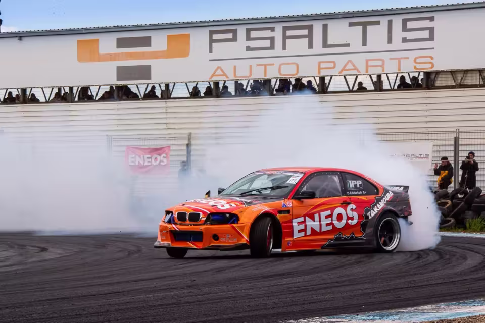 Racing car cornering at Achna Speedway race track in Cyprus